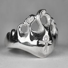 **Please note that we dispatch on Tuesdays unless special delivery express option is paid for** Original design, carved in wax then lost wax cast into solid sterling silver. All of our rings are made in London using recycled silver. First class recorded post included. Unique Hand Cast Sterling Silver Engraved Ring, Unique Hand Cast Signet Ring For Anniversary, Unique Sterling Silver Engraved Ring, Unique Hand Cast Sterling Silver Signet Ring, Hand Cast Engraved Silver Sterling Ring, Symbolic Silver Ring With Hand Cast Details, Symbolic Hand Cast Silver Engraved Ring, Lip Ring, Hand Ring