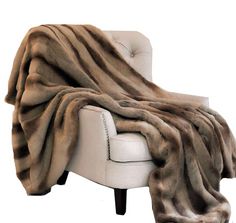 a chair with a blanket on top of it