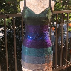 a dress made out of sequins and lace