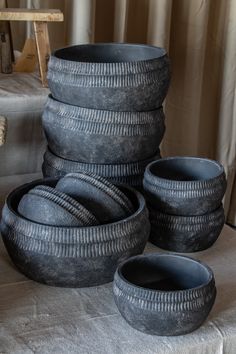 a stack of old tires sitting on top of a table