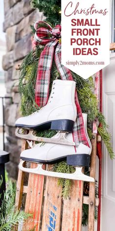 some ice skates are sitting in front of a sign that says christmas small front porch ideas