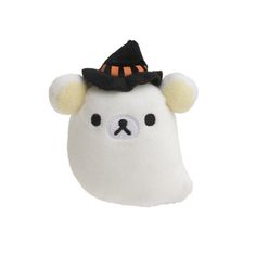 a white bear with a black hat on it's head