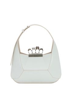 Jewelled Hobo bag by Alexander McQueen made of soft ivory calf leather with an antiqued silver-tone metal handle, decorated with Swarovski crystal rings. The original silhouette of this bag, inspired by the faceted stones of the Knuckle model, boasts leather panels that have been cut and assembled together. The bag features a black lining, a magnetic clasp, a single internal compartment, an internal card slot, an adjustable leather shoulder strap (18-28 cm), and antique silver-tone brass hardwar Blue Alexander Mcqueen, Dark Dusty Blue, Bride Vibes, Alexander Mcqueen Bag, Leather Jewels, Swarovski Crystal Rings, Single Button Blazer, Luxury Designer Handbags, Fancy Bags