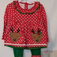 Nannette Kids Christmas Reindeer Polka Dot Two-Piece Set Red With White Polka Dot Top And Two Cute Reindeer On The Front Green Pants With Matching Anklets Size 18 Months Cute Winter Playtime Sets, Playful Long Sleeve Holiday Sets, Playful Cotton Sets For Holiday, Cotton Festive Holiday Sets, Festive Cotton Sets For Winter, Festive Winter Cotton Sets, Cotton Festive Winter Sets, Cute Cotton Holiday Sets, Cute Cotton Sets For Holidays