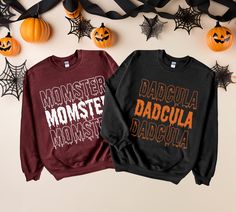 Momster and Dadcula Halloween Sweatshirts, Mom and Dad Halloween Gift, Couples Halloween Hoodie, Momster Sweatshirt, Dadcula Sweatshirt Gift  🎃 Momster and Dadcula Halloween Sweatshirts 🦇 Celebrate Halloween in spooky style with our Momster and Dadcula sweatshirts, specially designed for parents who love a good fright! These playful yet cozy sweatshirts feature a unique twist on classic Halloween characters, blending "mom" and "monster" into "Momster," and "dad" with "Dracula" to create "Dadcu Red Crew Neck Halloween Hoodie, Red Crew Neck Hoodie For Halloween, Text Shirt, Halloween Hoodie, Couple Halloween, Halloween Sweatshirt, Cozy Sweatshirts, Spirit Halloween, Halloween Gifts