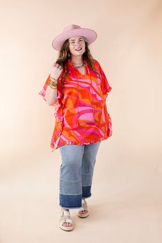 Introducing our vibrant 'Fun and Free' top, a must-have for your wardrobe! Designed with a playful orange and pink palette, this flowy top exudes charm with its ruffled sleeves and trendy tie neckline. Ideal for any occasion, its half-sleeve length ensures comfort while maintaining your stylish flair. Elevate your look effortlessly and embrace a carefree vibe with this versatile piece. Model: Abby is wearing a size M/L. Maci is wearing a size 1XL/2XL. Nancy is wearing a size 1XL/2XL. Size Sugges Trendy Multicolor Ruffle Sleeve Blouse, Playful Ruffled Blouse For Summer, Playful Summer Blouse With Ruffles, Trendy Multicolor Flutter Sleeve Blouse, Trendy Multicolor Flutter Sleeve Tops, Trendy Multicolor Blouse With Flutter Sleeves, Multicolor Ruffle Sleeve Tops For Beach, Playful Red Tops For Vacation, Pink Ruffle Sleeve Tops For Summer