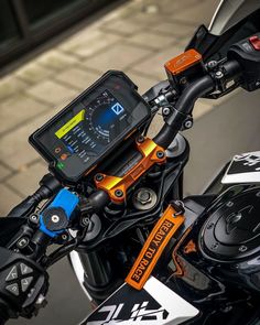 an electronic device mounted on the handlebars of a motorcycle