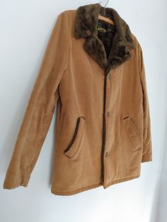 "Vintage 1960s Faux Fur Lined Corduroy Jacket SILTON of California  Men's Size 40 Trending Rancher Trucker Workwear Cowboy Coat  This coat is in excellent condition. It has been covered in a garment bag in the same closet for 55+ years, rarely, if ever, worn, in excellent condition, practically like new. No issues anywhere to report. Measurements: Underarm to Underarm: 20\" (Chest: 40\") Waist: 20\" Hip: 21\" Length: 29.5\" Arm Length: 28\" Shoulder to Shoulder: Underarm to Hem of Coat: 18\"  Collar: 21\" across, 5\" long Outside Pockets: 6.5\" long" Cowboy Coat, Wool Jackets Women, Work Coat, Cape Sweater, Leisure Suit, 90s Mens, Chore Coat, Twill Jacket, Car Coat