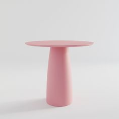 a pink round table on a white background with no one around it or someone else