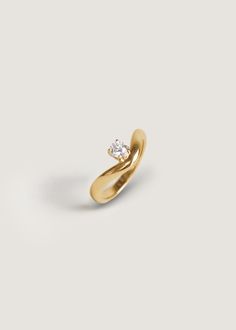 Sleek and modern, the Katherine ring features a round diamond set atop a 14k solid gold curved band. 14k solid gold—always Hollow Band width: 6.5mm (front), 2.5mm (back) Lab Created Diamond Carat weight: 0.26 ctw Diamond Cut: Round Full Diamond Clarity:VS Diamond Color: F/G/H Cut, Polish, Symmetry: Excellent Made to order: 4-6 weeks Luxury Classic Engraved Open Band Ring, 0 5 Carat Engagement Ring, Unique Gold Engagement Rings, Modern Diamond Ring, Small Diamond Ring, Floating Diamond Ring, Modern Diamond Rings, Gold Ring With Diamond, Small Diamond Rings