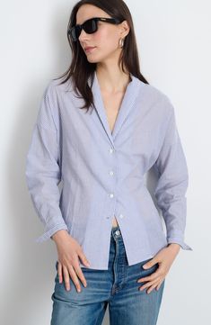 Breathable cotton voile gives a lovely feel to this soft button-up shirt completed by a dainty waist tie. 27" length (size Small) Front button closure Shawl collar Long sleeves with button cuffs Attached waist tie 100% cotton Machine wash, line dry Imported Cotton Shirt For Spring Daywear, Spring Daywear Shirt With Shirttail Hem, Spring Shirttail Hem Shirt For Daywear, Spring Daywear Shirt With Button Closure, Button-up Cotton Tops For Daywear, Relaxed Fit Shirt For Daywear, Spring Daywear Button-up Shirt, Classic Button-up Tops For Daywear, Spring Button-up Shirt For Daywear