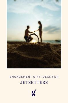 an engagement gift idea for jetsetteters with two people on the beach in the background