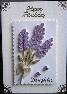 a happy birthday card with purple flowers on the front and white paper in the back