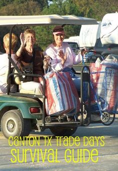 two people riding in a golf cart with bags on the back and luggage behind them