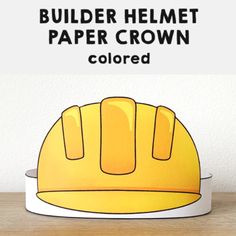 a helmet with the words builder helmet paper crown colored