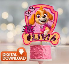 a pink birthday cake with a cartoon dog on top