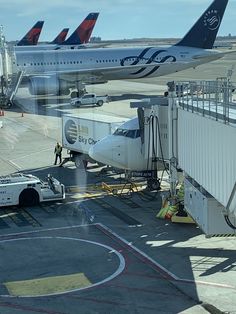 an airplane parked on the tarmac at an airport