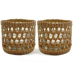 two wicker baskets sitting next to each other