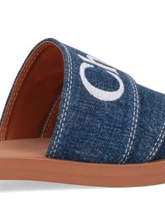 Upper: 99% Cotton, 1% Elastane Sole: 100% Rubber Designer Mules With Buckle Closure For Spring, Designer Slip-on Sandals With Branded Insole, Designer Summer Slides With Buckle Closure, Summer Slides With Branded Heel Counter And Open Toe, Casual Flat Heel Mules With Strap, Casual Flat Heel Mules With Heel Strap, Designer Spring Mules With Removable Insole, Designer Summer Slides With Cushioned Footbed, Open Toe Slides With Branded Heel Counter