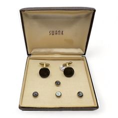 Swank 1940's Gold Plate & Smoke Mother of Pearl 4 Tuxedo Shirt Studs with Matching Cufflinks In Original Box Wedding Gifts. In Great Condition! The images are of the actual item listed - No Stock Photos are used. Rare to have 4 shirt studs as most stud sets from this era typically only have 3 studs.   Items can be picked up, which is sometimes easier or more cost effective.  There will be be a schedule date and time for pickup. Come check out The Missing Link, conveniently located in the heart o Vintage Round Cufflinks For Gift, Vintage Round Cufflinks As Gift, Screw Back Cufflinks For Wedding, Elegant Cufflinks With Gift Box, Classic Jewelry With Gift Box For Formal Occasion, Classic Jewelry In Gift Box For Formal Occasions, Classic Wedding Cufflinks With Gift Box, Antique Cufflinks For Anniversary, Elegant Formal Cufflinks With Gift Box