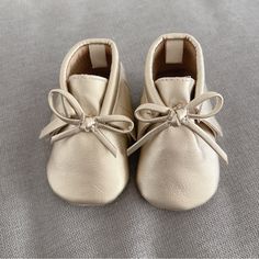 Brand New Without Tags Size: Newborn Gold Moccasins With Bow Detail Pull-On Tab For Easy On And Off Cream Booties With Round Toe For Playtime, Cream Round Toe Booties For Playtime, Cream Booties With Soft Sole For Spring, Cute Cream Booties With Soft Sole, Navy Shoes, Navy Gold, Bow Detail, Moccasins, Kids Shoes