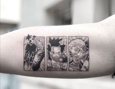 a person with a tattoo on their arm that has three different characters in it,