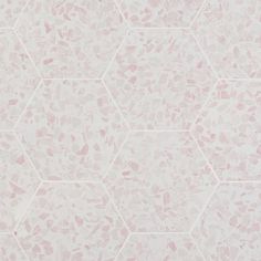 a white and pink wallpaper with hexagonal shapes