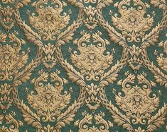 an old wallpaper with gold and green designs