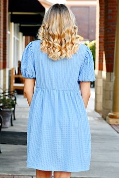 We have the PERFECT in style Spring dress for you! Our adorable babydoll square neck mini dress in blue is the perfect shade of everything you need. It's cute, flowy, and has a defined waist line with little stretch. Stay cool and look stunning. The dress also has everyone's favorite- pockets! ABOUT THIS ITEM: Made in China. Fabric is 97% Polyester / 3% Spandex. Hand Wash in Cold water. Hang or line dry. The Model is 5'5, and wearing a small. Size chart provided in photos. Maxi Tops, Jumpsuit Shorts Rompers, Tunic Sweater, Sleeveless Sweater, Loungewear Sets, Spring Dress, Square Neck, Long Tops, Baby Dolls