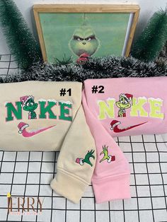 Embrace the holiday spirit with our adorable Cute Grinch Christmas Nike Embroidered Sweatshirt, the perfect Xmas gift for couples! Made with premium quality fabric, this sweatshirt offers exceptional comfort and warmth during the chilly winter days. The cute Grinch embroidery adds a festive touch, spreading joy and cheer wherever you go. With its trendy design and vibrant colors, this sweatshirt is sure to make you stand out at any holiday gathering. The Nike brand guarantees durability and styl Christmas Nike, Nike Embroidered Sweatshirt, Cute Grinch, Summer List, Preppy Gifts, Couple Ideas, Halloween 3, Embroidery Sweatshirt, Holiday Sweatshirt