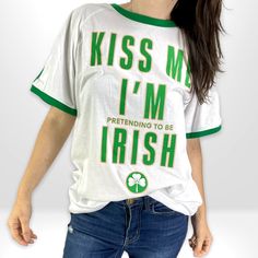 Graphic St. Patrick’s Day T Shirt Brand New With Tags. Kiss Me I’m (Pretending To Be) Irish Unisex Mens Graphic Tee In Size Large. Approximate Measurements: Chest: 22" Length: 31" Arm Length: 13" Great For St. Patrick’s Day! Ships Same Or Next Business Day! White Fan Apparel Tops With Lettering, St. Patrick's Day Cotton Crew Neck Tops, White Fan Apparel T-shirt With Lettering, Cotton Crew Neck Top For St. Patrick's Day, Retro White Tops With Lettering, Cotton Top With Letter Print For St. Patrick's Day, White Slogan Tops For Fan Apparel, T Shirt Brand, Shirt Brand