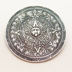 925 Sterling Silver Vintage Mexico Aztec Calendar Design Pendant / Pin Brooch Weight: 21.1g WELCOME TO PAWN SHOP We are an actual pawn shop and have been in business for over 25 years. Since 1990, our establishment has been serving a variety of clients by providing them with short term cash solutions and options of liquidity regarding their treasured heirlooms. Acknowledging that today′s customers are very sophisticated and are looking for a variety of investments, our acquisitions are hand-pick Spiritual Silver Brooch For Gift, Silver Sterling Silver Pendant Brooches, Spiritual Silver Brooch, Spiritual Silver Jewelry Brooch, Collectible Engraved Silver Brooch, Silver Medallion Brooches For Collectors, Silver Medallion Brooches As A Gift, Silver Hallmarked Brooch, Silver Stamped 925 Brooches As Gifts