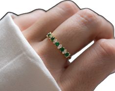 Green Emerald Stackable Diamond Ring, Green Stackable Rings With Prong Setting For Formal Occasions, Stackable Green Emerald Diamond Ring, Green Half Eternity Jewelry For Anniversary, Green Diamond Stackable Ring, Green Diamond Stackable Ring With Round Cut, Green Diamond Stackable Round Ring, Fine Jewelry Green Stackable Rings With Prong Setting, Green Stackable Rings With Prong Setting