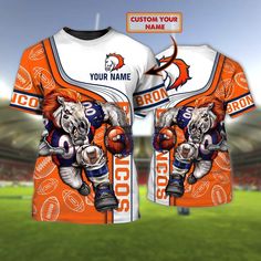 an orange and white football jersey with the image of a tiger on it's chest