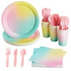 a set of pink and blue paper plates, forks, napkins and utensils