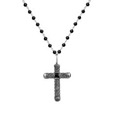 The "Profound Belief - Silver Matte Onyx Cross Charm Necklace" symbolizes the inner strength we receive from our faith as we enter new phases of our lives. Matte Onyx stones will encourage compassion for yourself and others and enhance your innate healing abilities. The sacred Cross knows how to put your soul in the needed flow for gaining the traits you've always wanted: altruism, long-lasting faith, and increased empathy. This way, you build more meaningful relationships and start to respect quality over quantity in every aspect of your life. 925 Oxidized Sterling Silver  4 mm Matte Onyx Stone  Care Guidelines Avoid contact with water, chemicals and perfumes as these may cause tarnishing and discoloration. Clean gently with a dry, non-abrasive cloth. Spiritual Onyx Cross Jewelry, Black Symbolic Cross Pendant Necklace, Spiritual Black Sterling Silver Cross Necklace, Black Symbolic Cross Pendant Jewelry, Symbolic Black Cross Pendant Jewelry, Black Engraved Pendant Cross Necklace, Black Spiritual Cross Pendant Necklace, Black Crucifix Necklace Engraved, Black Engraved Crucifix Necklace