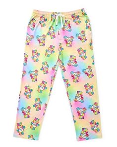 Show off your cute and cuddly style with these officially licensed Care Bears Lounge Pants. These soft pants feature Togetherness Bear's Pastel coloring and are perfect for relaxing all day long. Officially licensed Exclusively at Spencer's Elastic waistband Front pockets Drawstring closure Material: Polyester Care: Machine wash Imported Carebear Pajamas, Multicolor Cotton Sleep Pants, Playful Cotton Sweatpants For Loungewear, Multicolor Elastic Waistband Sweatpants For Loungewear, Cute Cartoon Print Bottoms For Sleepover, Playful Relaxed Fit Sweatpants For Loungewear, Multicolor Elastic Waistband Sleepwear For Lounging, Playful Cartoon Print Bottoms For Sleepover, Casual Cartoon Print Bottoms For Pajama Party