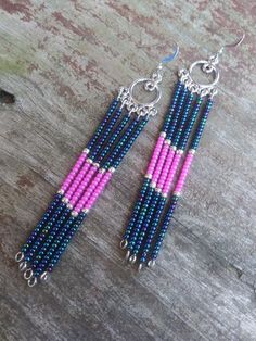 These multi strand beaded earrings feature blue and pink seed beads. Bohemian Pink Earrings With Spacer Beads, Pink Dangle Beaded Earrings With Spacer Beads, Beading Ideas, May 21, Blue And Pink, Multi Strand, Diy Jewelry Making, Beaded Earrings, Favorite Jewelry