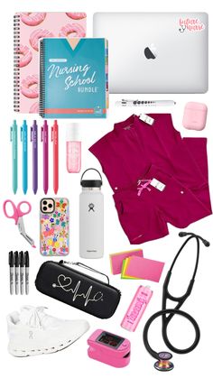 the contents of a woman's travel bag including an apple laptop, notebook and other items