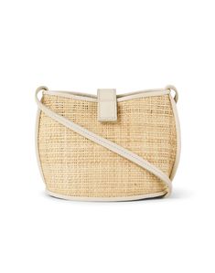 Bembien's Paola bag is the perfect bohemian-inspired carryall. Crafted from soft woven raffia, it's lined with an interior pocket and features a cream colored adjustable crossbody strap so you can wear it your way. Style this seasonless essential with your favorite casual looks for a chic finish. Vacation Woven Leather Pouch Shoulder Bag, Woven Leather Pouch Shoulder Bag For Vacation, Travel Woven Leather Shoulder Bag In Natural Color, Natural Woven Leather Hobo Bag For Travel, Summer Natural Hobo Bag With Removable Pouch, Natural Hobo Bag With Removable Pouch For Summer, Travel Satchel In Beige Woven Leather, Beige Woven Leather Crossbody Bucket Bag, Beige Woven Leather Satchel For Travel