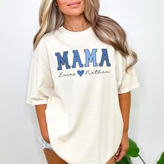 *IF YOU REQUEST A PROOF BEFORE PRINTING, PLEASE RESPOND WITHIN 24 HOURS AFTER RECEIVING THE PROOF. WE WILL SEND YOUR ORDER INTO PRODUCTION AFTER 24 HOURS* THANK YOU :) You will love this personalized mama shirt! It makes a great custom gift for moms! PRODUCTION TIME: 1-3 business days SHIPPING TIME: 2-5 business  days  PRODUCT DESCRIPTION: Bella Canvas Unisex T-shirt Super soft cotton and excellent quality print makes. 100% Soft cotton (fibre content may vary for different colors) Light fabric ( Mama Shirt Ideas, Mama Tee Shirts, Children Names, Mama Tee, Mama Shirts, Mama Shirt, Clothing Ideas, Mom Shirt, Unisex Style