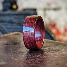 a wooden ring sitting on top of a table