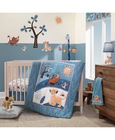 a baby's room with blue walls and teddy bears on the wall, including a crib