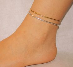 "* AVAILABLE FEDEX EXPRESS SHIPPING UPGRADE 3-5 WORKING DAYS * Handmade ankle bracelet made of brass, aluminium or sterling silver 925 wire and adjustable chain. 7.5 Inches, are adjustable and It has great flexibility to adapt . They are easy and simple to use and can be worn as a compliment to your existing gold or silver pieces or on their own. Each bracelet has a shiny finish for a touch of sophistication. All ingredients used in production are non-allergic. However, due to the fact that ever Adjustable Gold Sterling Silver Anklets, Gold Sterling Silver Anklet As Gift, Dainty Adjustable Sterling Silver Anklets, Adjustable Hypoallergenic Sterling Silver Anklets, Adjustable Gold Minimalist Anklet, Adjustable Minimalist Gold Anklet, Dainty Adjustable Nickel-free Anklets, Gold Minimalist Handmade Anklet, Minimalist Handmade Gold Anklets