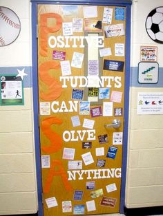 a bulletin board with writing on it in a school gym door decorated with stickers and magnets