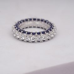 Round Band Ring, Moissanite Band, Full Eternity Band, Women's Wedding Ring, Bridesmaid Gift, Anniversary Band Blue Sapphire, Vintage Ring. These 925 sterling silver Beautiful white classical round diamond and blue sapphire white and blue is a symbolized of western look . These full eternity white ring band is suitable for all types of skin tones all types of customization are available we make these as per the requirements.  these band ring is made out by our experience craftsman . all types of Formal Stackable Cubic Zirconia Crystal Ring, Formal Stackable Crystal Ring With Cubic Zirconia, Formal Cubic Zirconia Stackable Crystal Ring, Elegant Sapphire Eternity Band For Formal Occasions, White Gold Sapphire Crystal Wedding Ring, Sapphire Half Eternity Jewelry With Cubic Zirconia, Wedding Sapphire Crystal Ring In Silver, Silver Sapphire Crystal Ring For Wedding, Sapphire Cubic Zirconia Half Eternity Jewelry