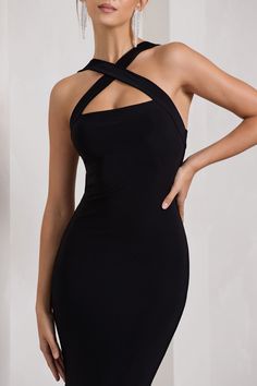 Carefully cut in a premium stretch jersey that clings to each curve. this black maxi dress is as flattering as it is flawless. Detailed by delicately criss-crossing straps. Cross My Heart is the epitome of understated glamour. For the perfect wedding guest look. try complimenting this halter-neck dress with a sleek bun and gold accents. Features - Premium stretch jersey- Crossed halter neckline- Sleeveless- Bum ruching- Maxi length Sizing & Fit Model is 5'7" and wears UK size 8 / US size 4 Produ Black Stretch Halter Maxi Dress, Spaghetti Strap Elastane Maxi Dress For Night Out, Spaghetti Straps Elastane Maxi Dress For Night Out, Elastane Maxi Dress With Spaghetti Straps For Night Out, Fitted Cross Back Maxi Dress For Night Out, Black Backless Elastane Maxi Dress, Black Stretch Mini Dress With Crisscross Straps, Fitted Maxi Dress With Crisscross Straps For Night Out, Maxi Dress With Crisscross Straps For Date Night