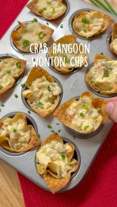 a muffin tin filled with crab rangoon wonton cups