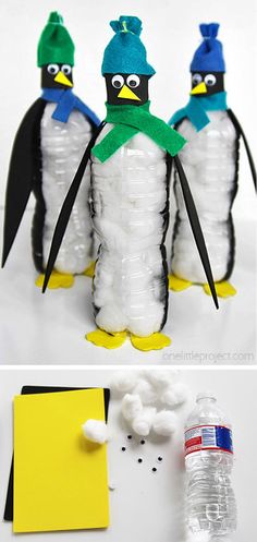 two penguins made out of plastic bottles and some paper