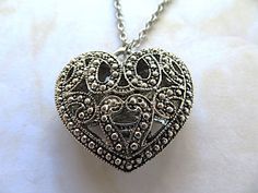 Vintage-925 Silver plated hollow filigree love heart-locket-26 inch necklace-gift See other gift items at my shop at https://www.Merlinscaveshop.com A PERFECT PLACE TO FIND THAT SOMETHING SPECIAL Antique Silver Pendant Necklaces For Keepsake, Antique Silver Pendant Necklace For Keepsake, Open Heart Metal Jewelry For Wedding, Silver Round Locket Heart Necklace, Silver Round Locket Necklace For Valentine's Day, Silver Locket Necklace For Valentine's Day, Silver Locket For Valentine's Day, Engraved Heart-shaped Metal Jewelry, Heart Pendant Metal Locket Jewelry